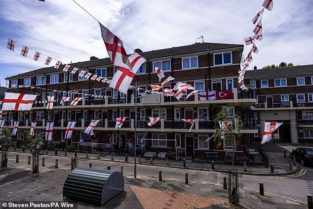 England flags at the Kirby Estate in South East London today ahead of the Denmark match