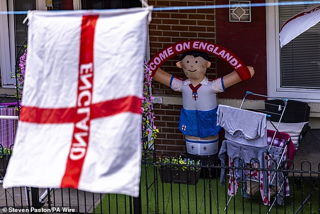 England flags at the Kirby Estate in South East London today ahead of the Denmark match