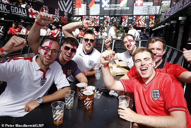 England fans enjoy a beer as they prepare to cheer on the team at Boxpark Croydon today