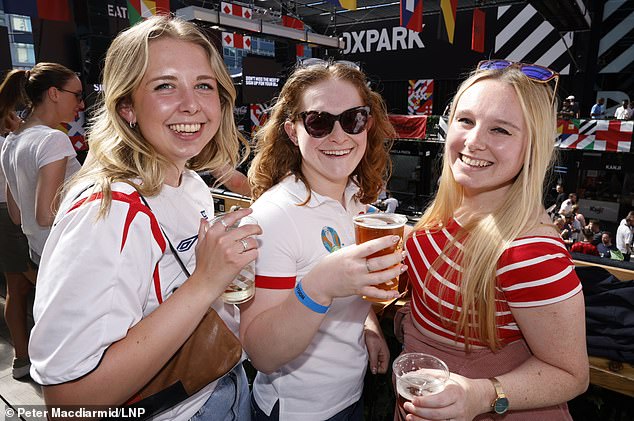 Fans gather for England's match against Denmark at Boxpark Croydon in London today