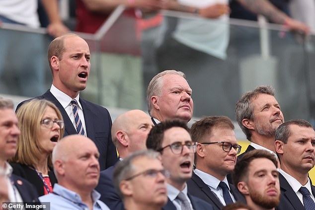 Prince William is seen singing the national anthem at the Frankfurt Arena