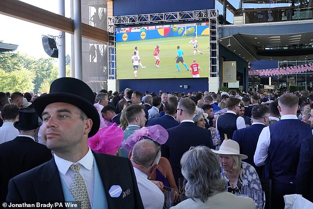 Racegoers turned their attention to the tense Euros clash