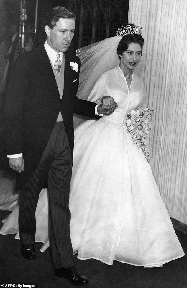 Princess Margaret leaves hand-in-hand with Antony Armstrong-Jones following their wedding ceremony at Westminster Abbey on May 6, 1960