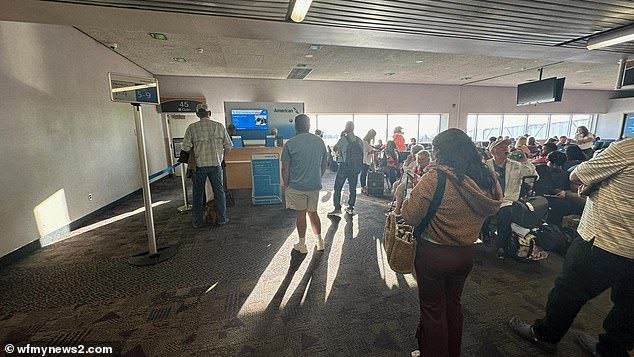 They were forced to leave the plane and wait for further information about their flight which was delayed for several hours