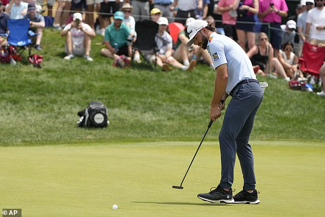 He drew himself to 11-under for the day by rolling in a five-foot putt at the 17th