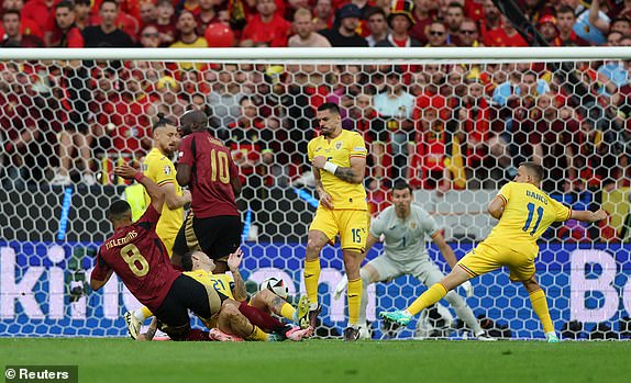 Soccer Football - Euro 2024 - Group E - Belgium v Romania - Cologne Stadium, Cologne, Germany - June 22, 2024 Belgium's Youri Tielemans scores their first goal REUTERS/Thilo Schmuelgen