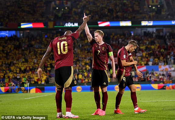 COLOGNE, GERMANY - JUNE 22: Romelu Lukaku of Belgium celebrates scoring a goal with teammate Kevin De Bruyne which was later ruled out for offside following a VAR review during the UEFA EURO 2024 group stage match between Belgium and Romania at Cologne Stadium on June 22, 2024 in Cologne, Germany. (Photo by Ryan Pierse - UEFA/UEFA via Getty Images)