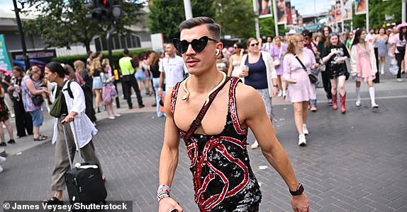 Mandatory Credit: Photo by James Veysey/Shutterstock (14553899c) A Taylor Swift fan arriving ahead of the concert Fans attending Taylor Swift in concert, Eras Tour at Wembley Stadium, London, UK - 23 Jun 2024