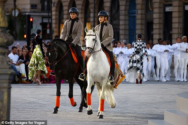 Kendall Jenner and Gigi Hadid rode the runway on horses as they led the star-studded Vogue World Paris show on Sunday evening