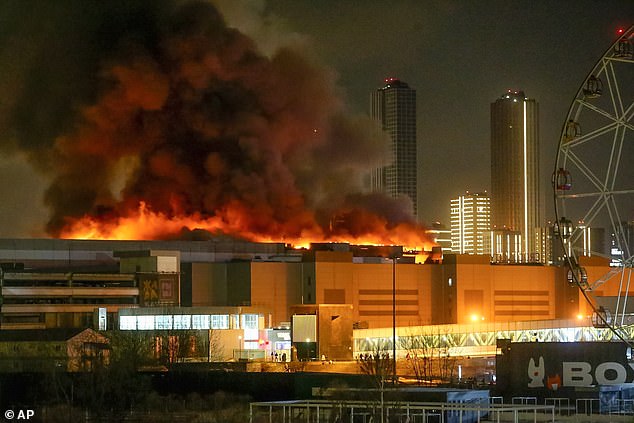 A massive blaze is seen over the Crocus City Hall on the western edge of Moscow