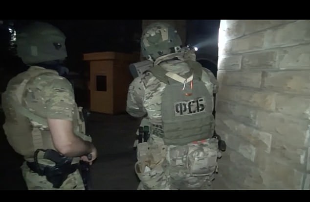 Members of Russia's FSB domestic security service are seen amid the anti-terror operation in Dagestan last night