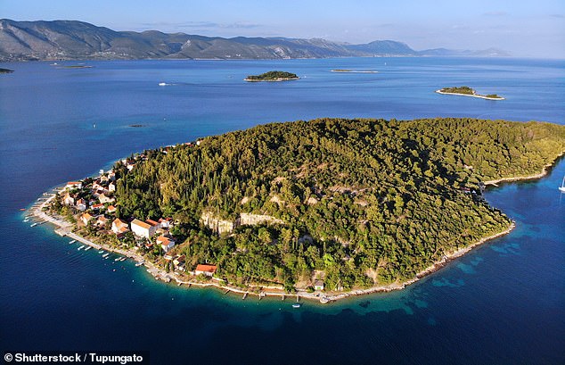 Vrnik in Croatia, above, offers 'a Mediterranean postcard scene where seeing a pack of dolphins is nothing unusual'