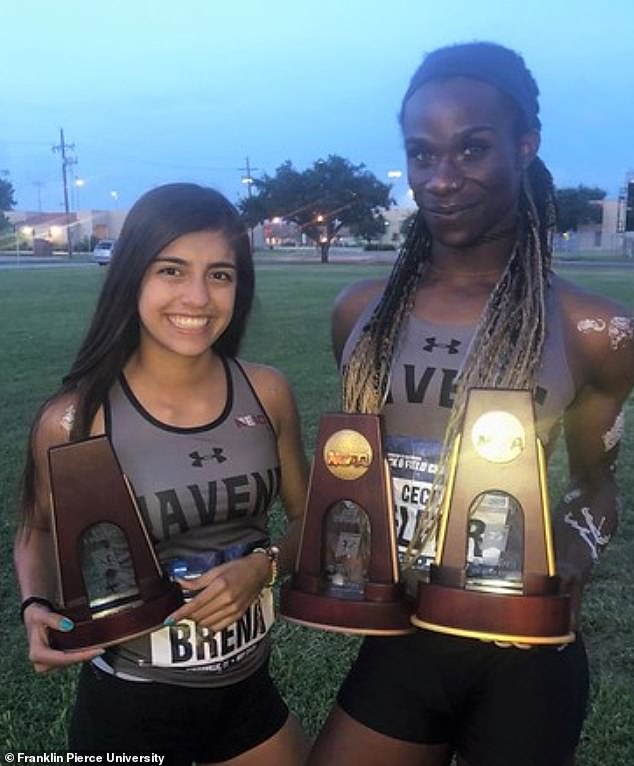 Telfer (right) pictured after winning a Division II national title in the 400-meter hurdles as a senior at Franklin Pierce University  in 2019