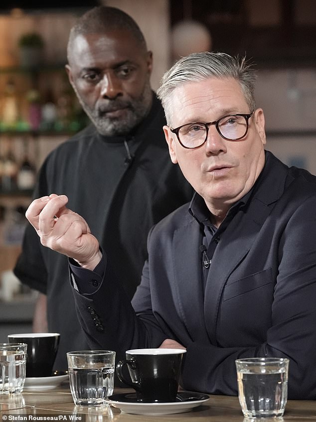 Keir Starmer (pictured with actor Idris Elba talking about knife crime today) issued a rebuke to Gary Lineker as he insisted people should get behind the England team