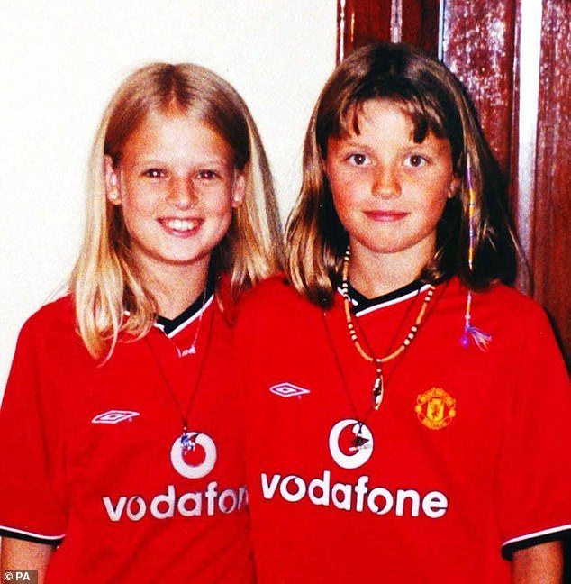 Holly Wells (left) and her best friend Jessica Chapman (right) pictured in their Manchester United shirts shortly before they disappeared in Soham, Cambridgeshire, on August 4, 2002