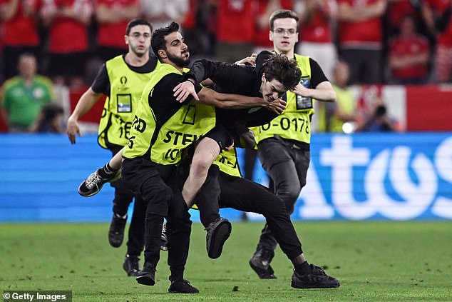 The game's liveliest moment came in the closing stages when a pitch invader ran on in Munich