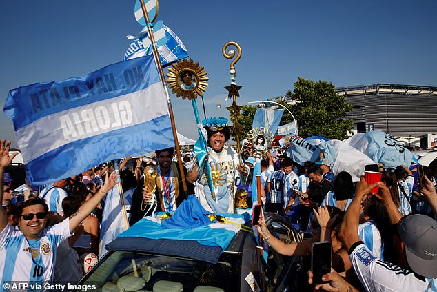 Argentinian fans cheer before the Conmebol 2024 Copa America tournament group A football match between Chile and Argentina