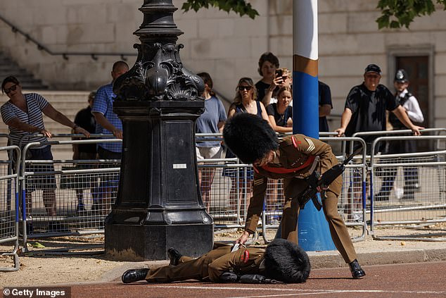A Cavalry Guard is believed to have fainted on The Mall in London during rehearsals on Tuesday