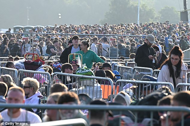 Visitors queue ahead of gates opening at 8am during day one of Glastonbury Festival 2024
