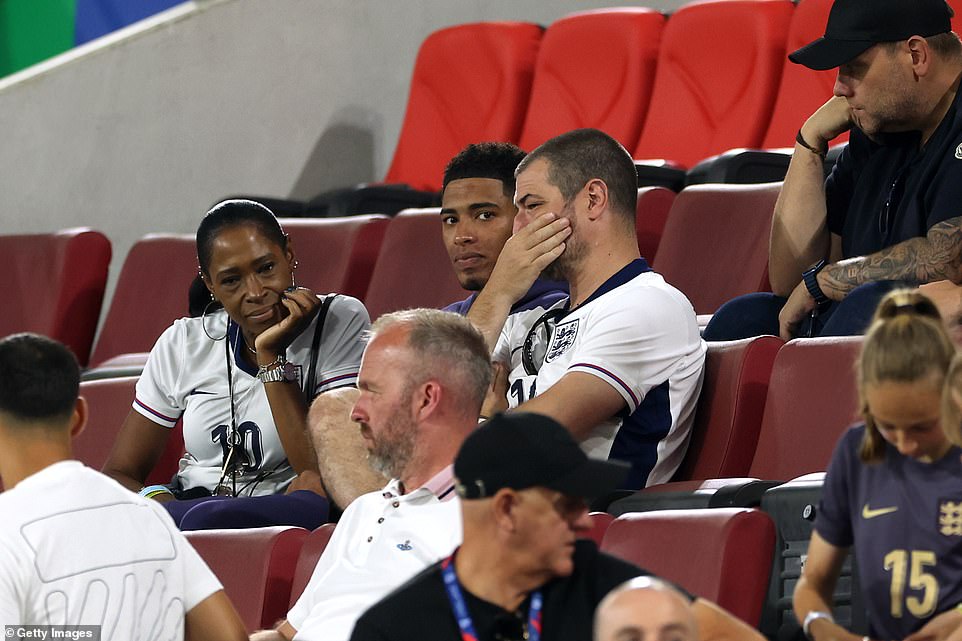 Following the game, England players were consoled by their emotional family members and glamorous WAGs. Jude Bellingham's parents looked close to tears as they comforted the midfielder in the stands after the team's 'abysmal' sleepwalk into the Euro 2024 knock out stages at Cologne Stadium.