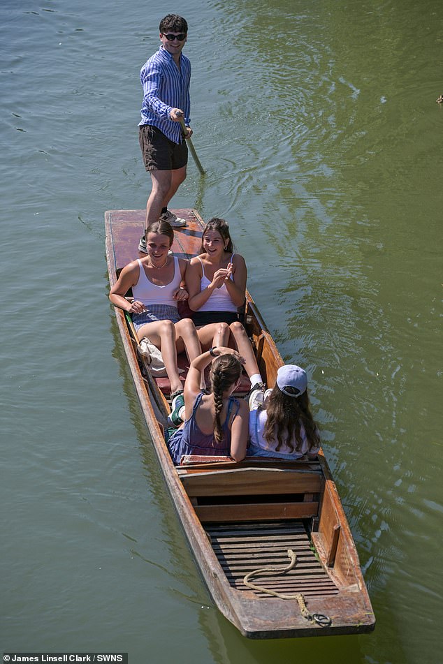 People out and about enjoying the blistering heat along the River Cam in Cambridge