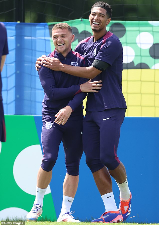 Trippier looking happy and relaxed during England training this week, seen here with Jude Bellingham