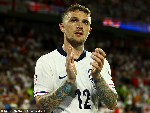 Trippier applauds the fans after last night's match between England and Slovenia