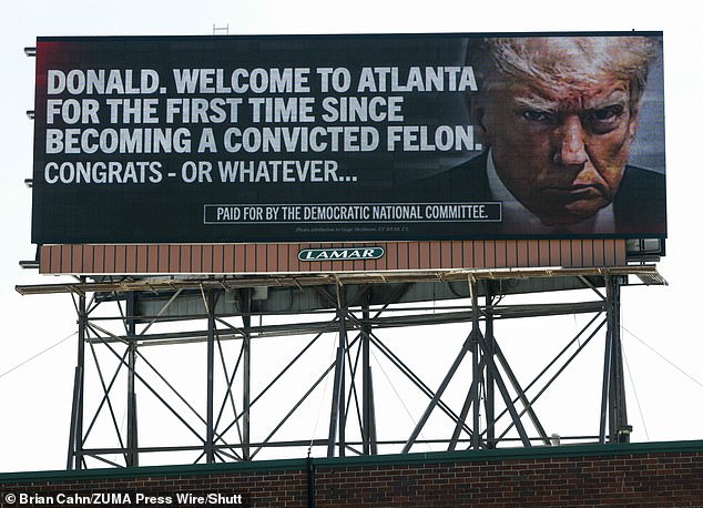 Democrats ran a billboard ad in five busy highways in Atlanta sarcastically welcoming Trump to the Georgia city 'for the first time since becoming a convicted felon'