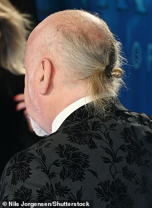 It is in stark contrast to the unusual man bun he attempted while attending the 2022 premiere of Avatar: The Way of Water