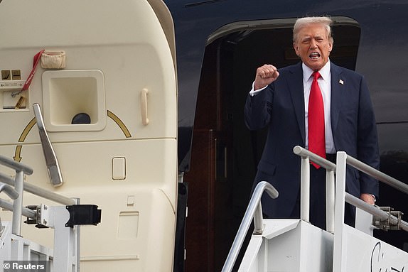 Republican presidential candidate and former U.S. President Donald Trump arrives for the first 2024 presidential debate with U.S. President Joe Biden, hosted by CNN in Atlanta, at Hartsfield-Jackson Atlanta International Airport, Georgia, U.S., June 27, 2024.  REUTERS/Megan Varner