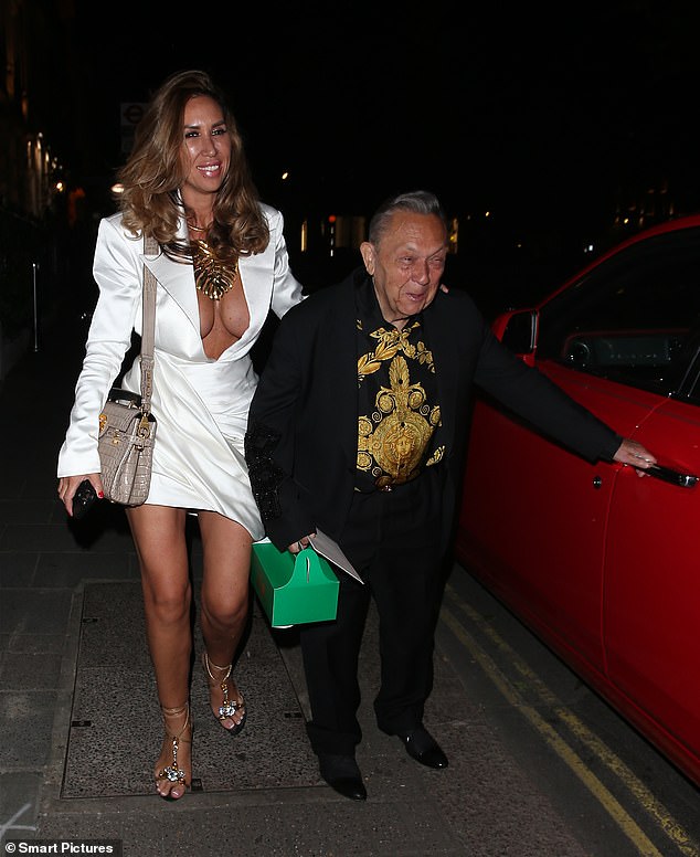 Ampika Pickston turned heads as she left private members club Annabel's in London on Thursday alongside her billionaire fiancé David Sullivan