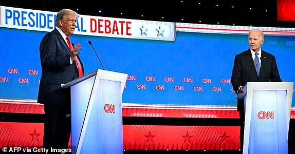 US President Joe Biden and former US President and Republican presidential candidate Donald Trump participate in the first presidential debate of the 2024 elections at CNN's studios in Atlanta, Georgia, on June 27, 2024. (Photo by ANDREW CABALLERO-REYNOLDS / AFP) (Photo by ANDREW CABALLERO-REYNOLDS/AFP via Getty Images)