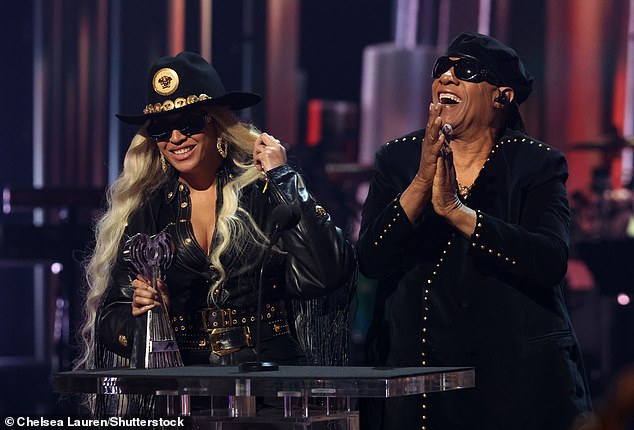 'I¿m honored to introduce so many people to the roots of so many genres. I¿m so thrilled that my fans trusted me,' Beyoncé said of Renaissance and Cowboy Carter; pictured with Stevie Wonder on April 1 in LA