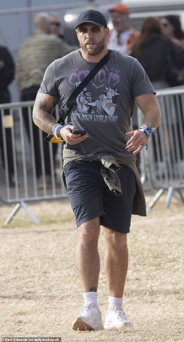 Meanwhile the I'm A Celeb showcased his buff physique in a fitted T-shirt and shorts