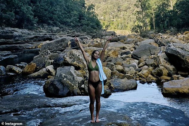 Mary Fowler (pictured) showed off her figure in an olive bikini as she headed for a romantic waterfall swim with her boyfriend Nathan Cleary