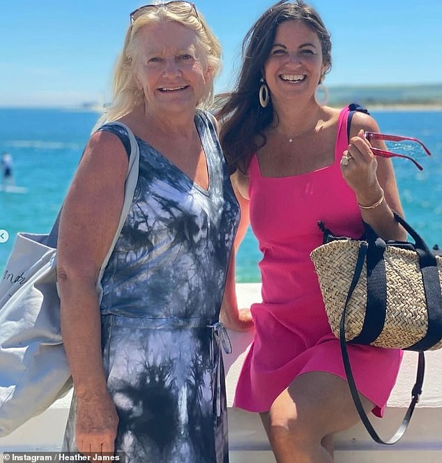 Another in the post pictured Heather and Deborah together, sat in front of beach, in colourful ensembles