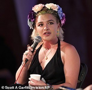 She was well and truly in the festival spirit and wore a colourful and kooky flora headpiece which she matched to her eye make-up