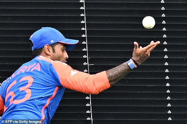 He nearly lost control of ball as he went for the catch but was able to keep it at the second time of asking