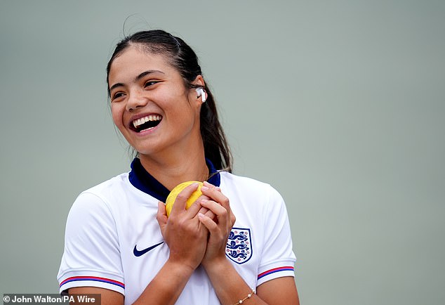 A gleeful Raducanu took part in catching practice ahead of the tennis tournament, which starts on Monday