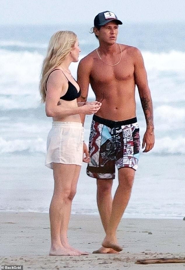Ellie has since moved on with hunky surfer Armando Perez (pictured together in March)