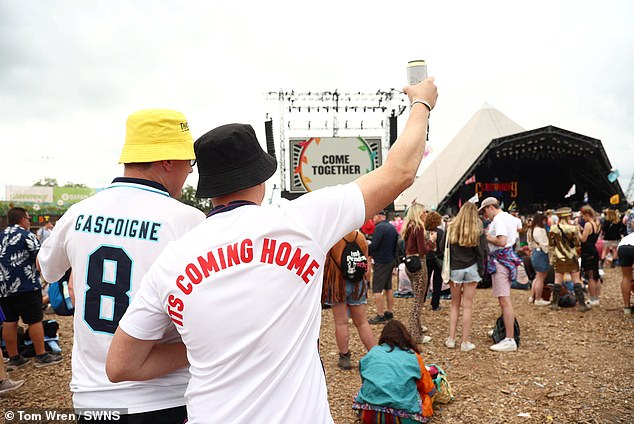 Glastonbury fans have been pictured getting excited for tonight's England match