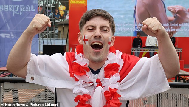 Another Three Lions devotee gives a rallying cry in Times Square, Newcastle, ahead of kick-off