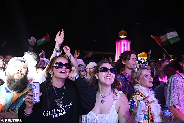 Revellers dance as they watch Peggy Gou perform on the Park Stage