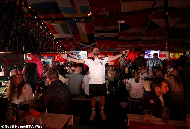 SOUTH TYNESIDE -- A fan spreads his arms wide at Dougie's Tavern