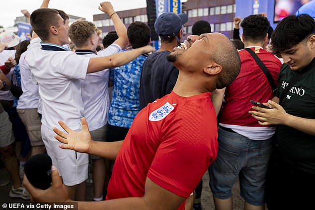 Relieved England supporters at the official Fan Zone Nordsternpark in Gelsenkirchen