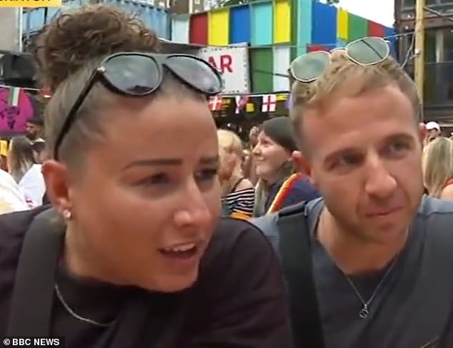 Agony: These England fans were telling a BBC interviewer that Gareth Southgate would surely have to step down moments before Jude Bellingham scored