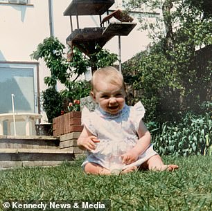 Avalon as a baby sat in the garden