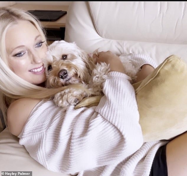 The TV presenter pictured snuggling up a four legged friend. She attributes her healthy healing to mindfulness and a strong network of support