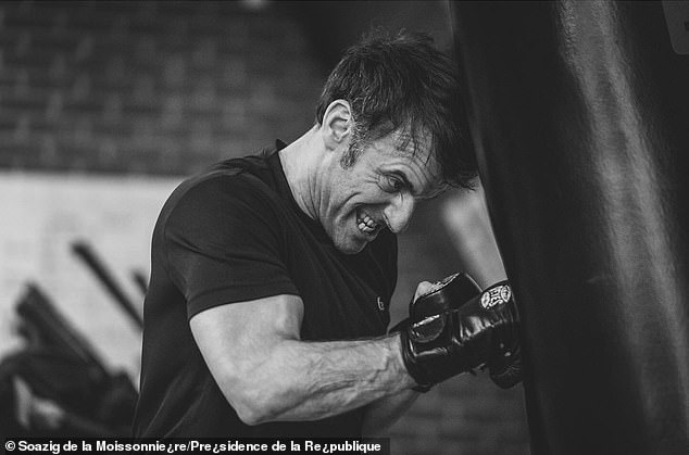 Emmanuel Macron's official photographer releases pictures of the French President in a boxing gym in March 2024