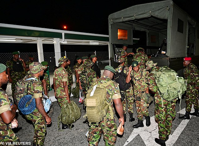 Members of the Trinidad and Tobago Regiment arrive ahead of Hurricane Beryl at Tobago's A.N.R. Robinson International Airport in Crown Point, Trinidad and Tobago June 30, 2024